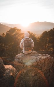 Preview wallpaper man, backpack, hood, nature, alone