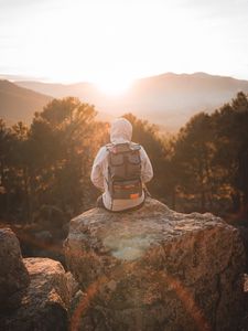 Preview wallpaper man, backpack, hood, nature, alone