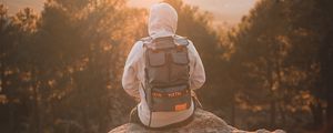 Preview wallpaper man, backpack, hood, nature, alone
