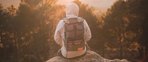 Preview wallpaper man, backpack, hood, nature, alone