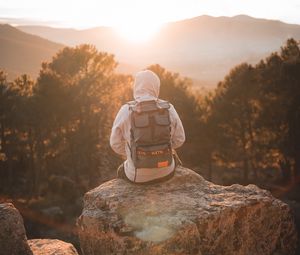 Preview wallpaper man, backpack, hood, nature, alone