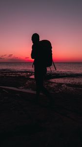 Preview wallpaper man, backpack, silhouette, beach, dark