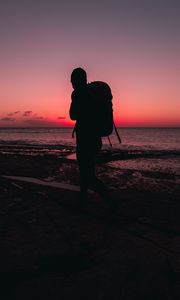 Preview wallpaper man, backpack, silhouette, beach, dark