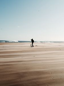 Preview wallpaper man, beach, alone, photographer, nature