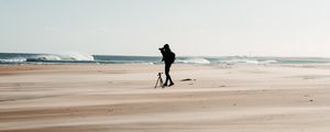 Preview wallpaper man, beach, alone, photographer, nature