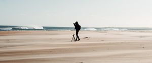 Preview wallpaper man, beach, alone, photographer, nature