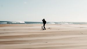 Preview wallpaper man, beach, alone, photographer, nature