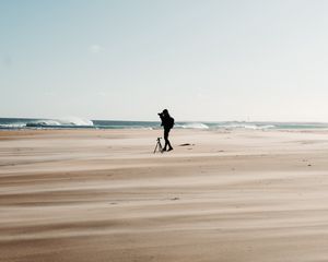 Preview wallpaper man, beach, alone, photographer, nature