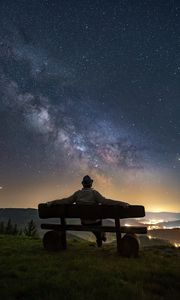 Preview wallpaper man, bench, starry sky