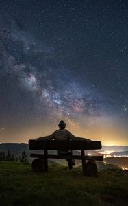 Preview wallpaper man, bench, starry sky