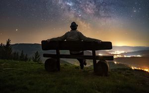 Preview wallpaper man, bench, starry sky