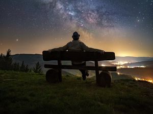 Preview wallpaper man, bench, starry sky