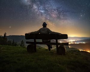 Preview wallpaper man, bench, starry sky