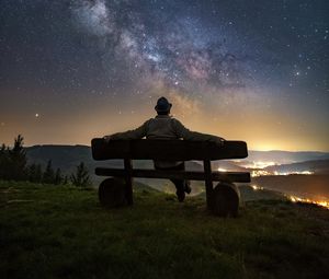 Preview wallpaper man, bench, starry sky