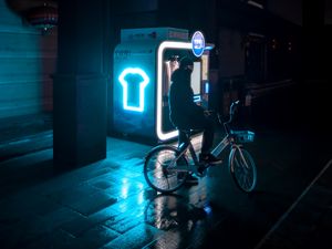 Preview wallpaper man, bicycle, city, street, dark