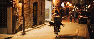 Preview wallpaper man, bike, courier, street, lights, night