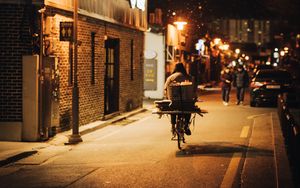 Preview wallpaper man, bike, courier, street, lights, night