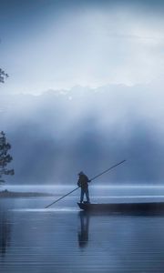 Preview wallpaper man, boat, lake, fog, dusk