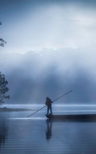 Preview wallpaper man, boat, lake, fog, dusk