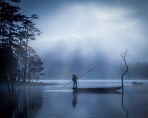 Preview wallpaper man, boat, lake, fog, dusk