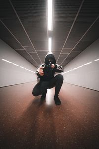 Preview wallpaper man, camera, lens, photographer, hood, tunnel