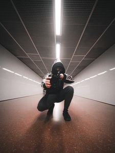 Preview wallpaper man, camera, lens, photographer, hood, tunnel