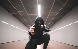 Preview wallpaper man, camera, lens, photographer, hood, tunnel