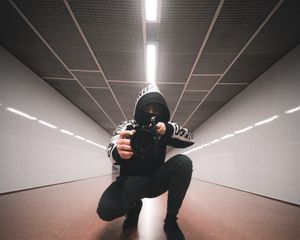 Preview wallpaper man, camera, lens, photographer, hood, tunnel