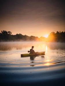 Preview wallpaper man, canoe, lake, sunset, fog