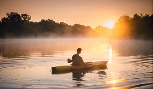 Preview wallpaper man, canoe, lake, sunset, fog