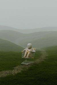 Preview wallpaper man, cart, hills, grass, fog, art