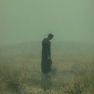 Preview wallpaper man, cloak, hat, field, fog, dark, art