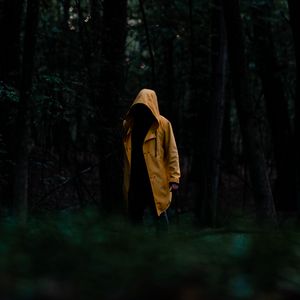 Preview wallpaper man, cloak, yellow, trees, forest