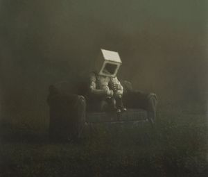 Preview wallpaper man, cube, sofa, fantasy, loneliness, sadness, art