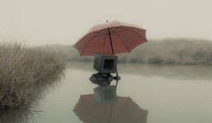 Preview wallpaper man, cube, umbrella, swamp, art