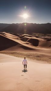 Preview wallpaper man, desert, dunes, sun, sand