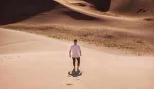 Preview wallpaper man, desert, dunes, sun, sand