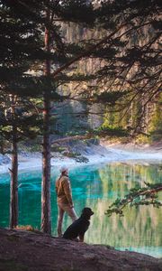 Preview wallpaper man, dog, lake, nature, walk