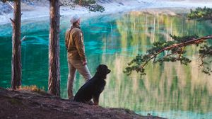 Preview wallpaper man, dog, lake, nature, walk