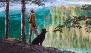 Preview wallpaper man, dog, lake, nature, walk