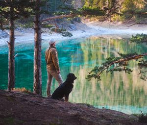 Preview wallpaper man, dog, lake, nature, walk