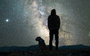 Preview wallpaper man, dog, night, starry sky, nebula