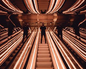 Preview wallpaper man, escalator, reflection, mirror, backlight