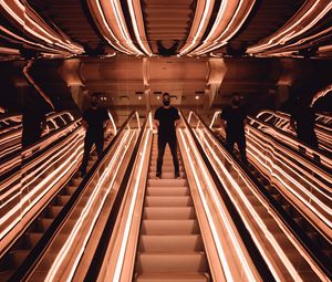 Preview wallpaper man, escalator, reflection, mirror, backlight