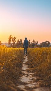 Preview wallpaper man, field, path, grass, rabat, morocco