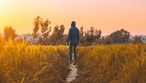 Preview wallpaper man, field, path, grass, rabat, morocco