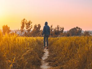 Preview wallpaper man, field, path, grass, rabat, morocco