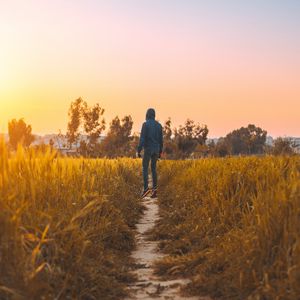 Preview wallpaper man, field, path, grass, rabat, morocco