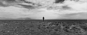 Preview wallpaper man, field, sky, bw