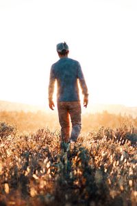 Preview wallpaper man, field, sunlight, light, bright